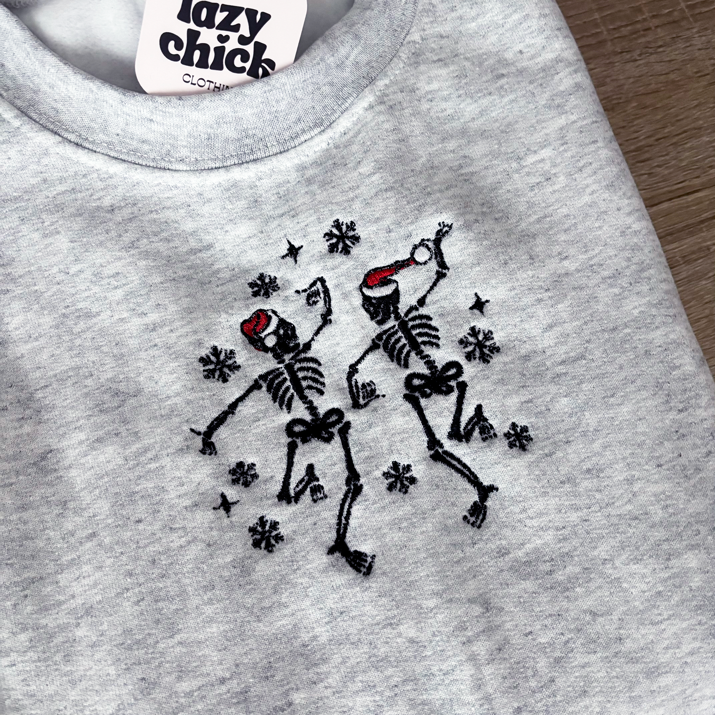 DANCING CHRISTMAS SKELETONS Ash Gray Embroidered Christmas Crewneck Sweatshirt