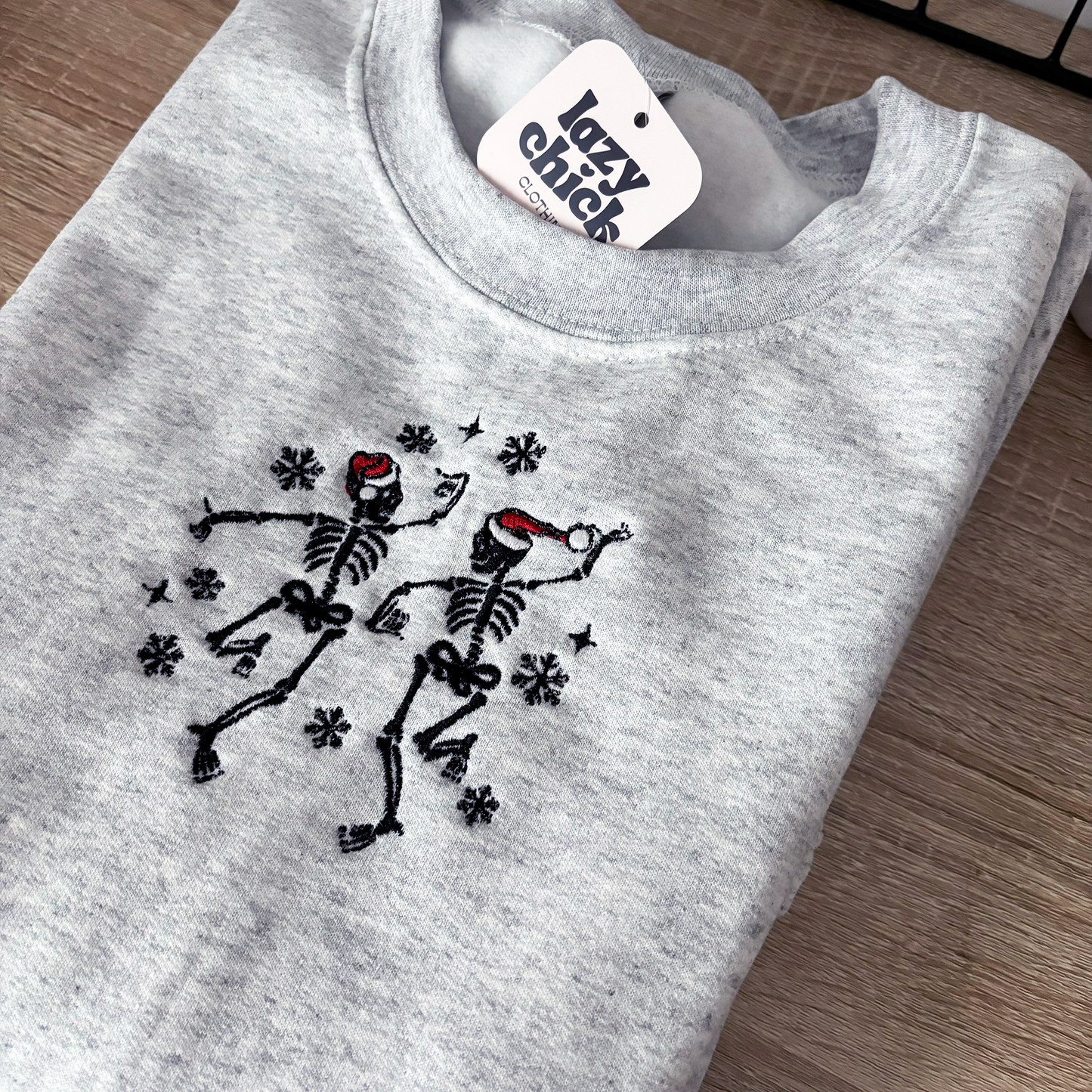 DANCING CHRISTMAS SKELETONS Ash Gray Embroidered Christmas Crewneck Sweatshirt