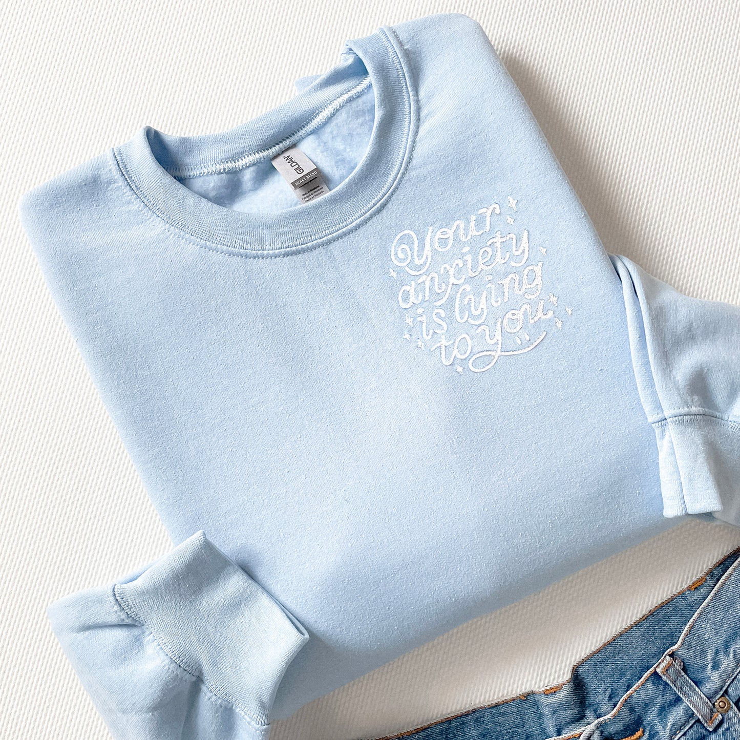 YOUR ANXIETY IS LYING TO YOU - Baby Blue Crewneck Sweatshirt