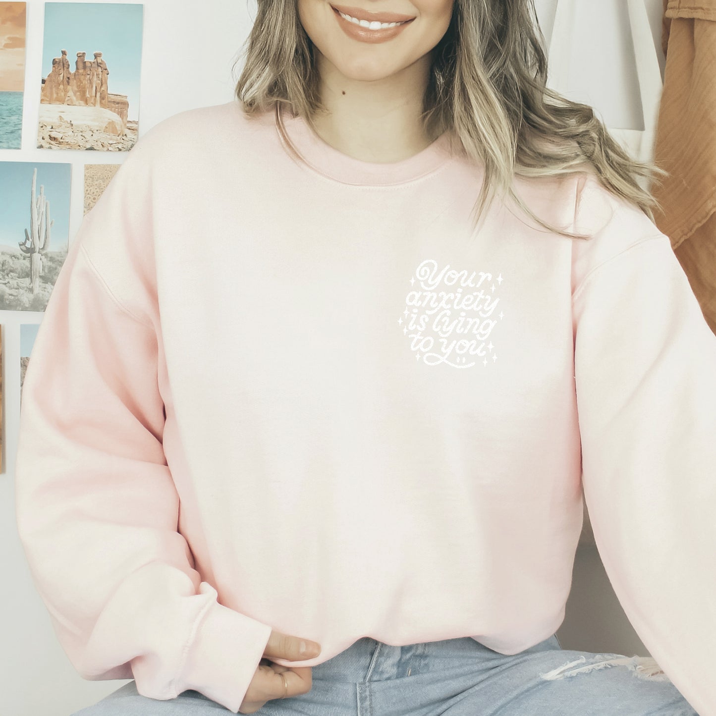 YOUR ANXIETY IS LYING TO YOU Soft Pink Crewneck Sweatshirt